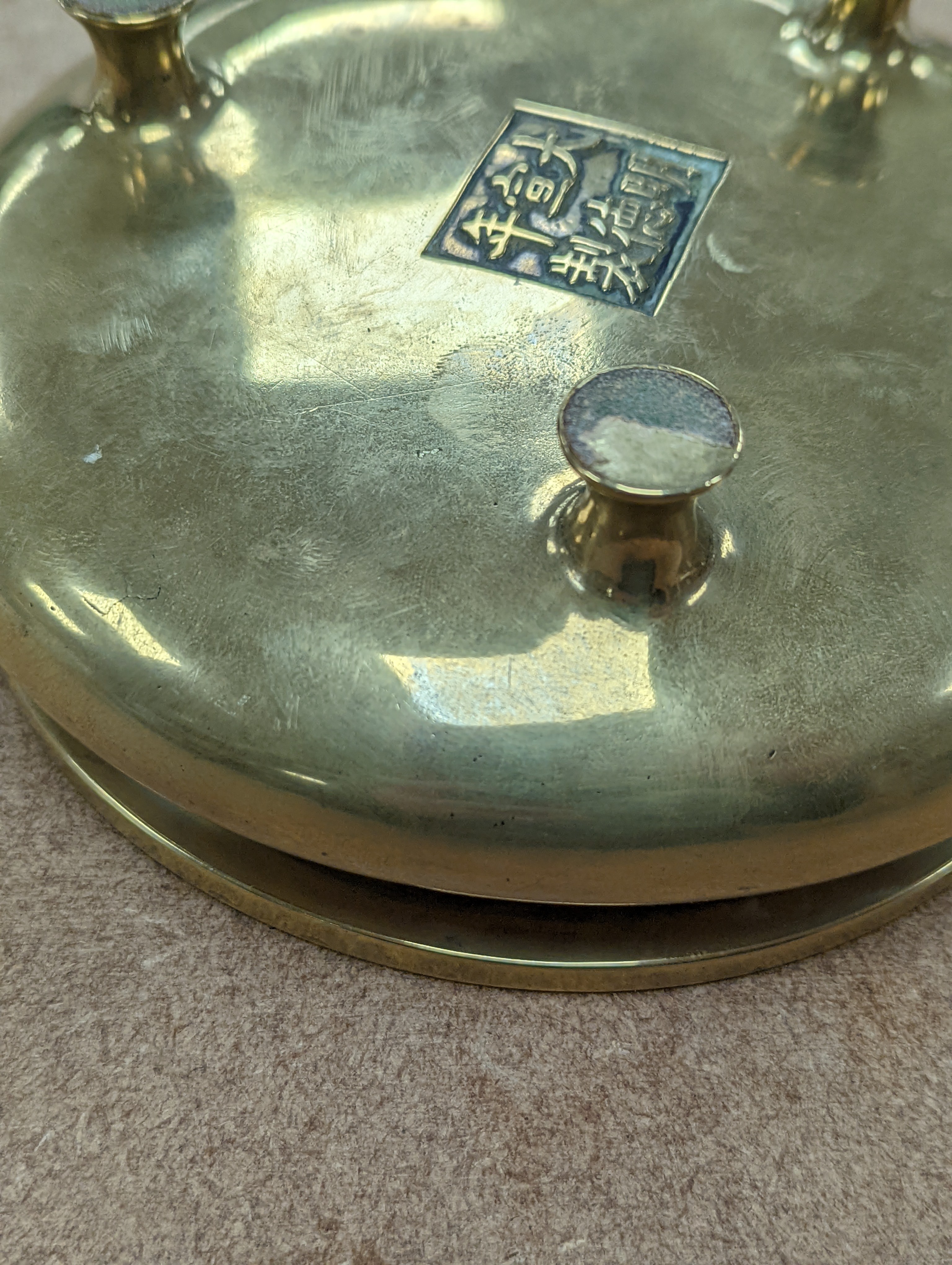 A Chinese bronze censer, ding, Xuande mark, 18th / 19th century, diameter 16.6cm, height 6.7cm